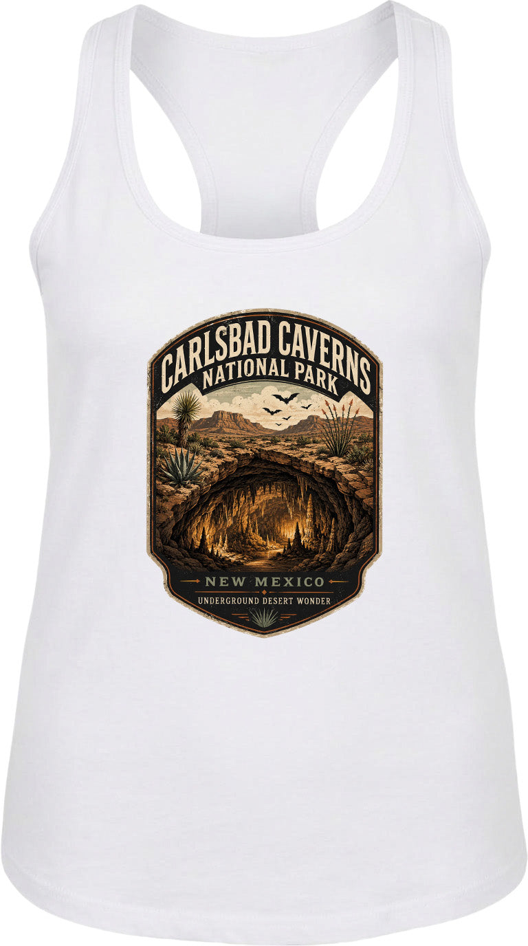 A white tank top with a graphic design depicting the Carlsbad Caverns National Park in New Mexico, featuring a desert landscape with a cave and birds in the sky.
