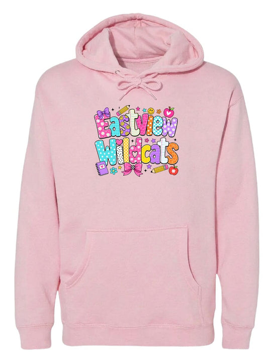 A pink hoodie with a colorful graphic design featuring the text "Eastview Wildcats" and various decorative elements.