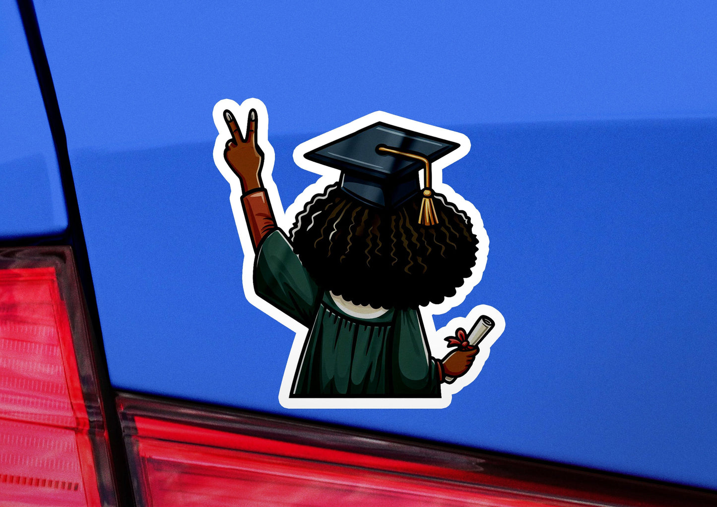 a car with a sticker of a man in a graduation cap