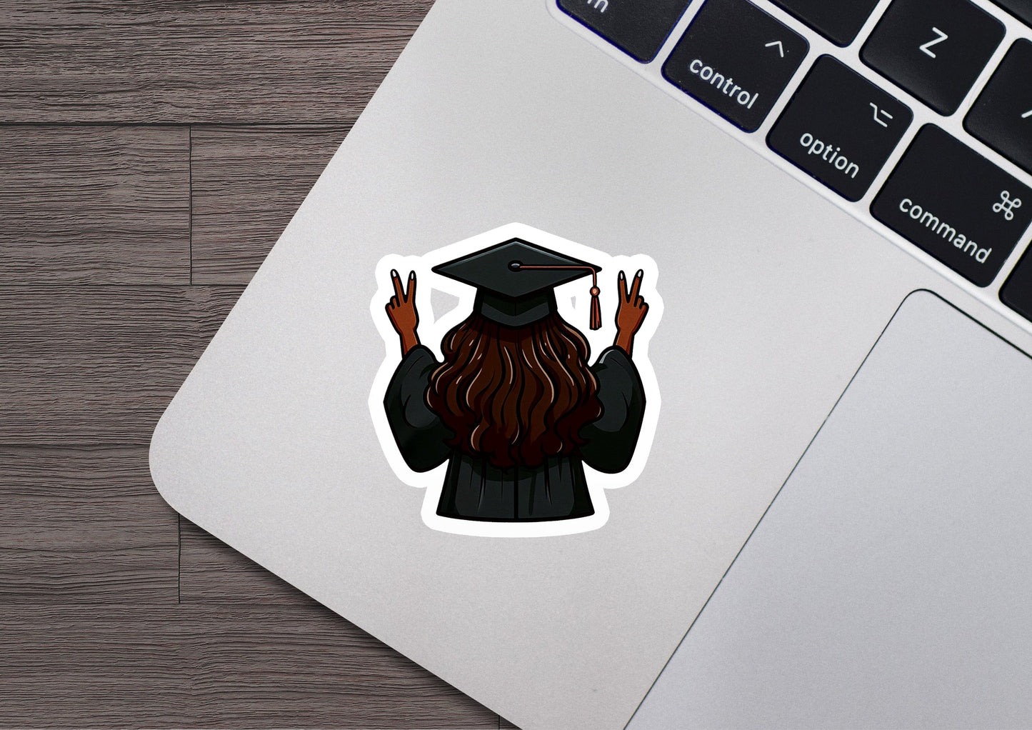 a laptop with a sticker of a man with a beard
