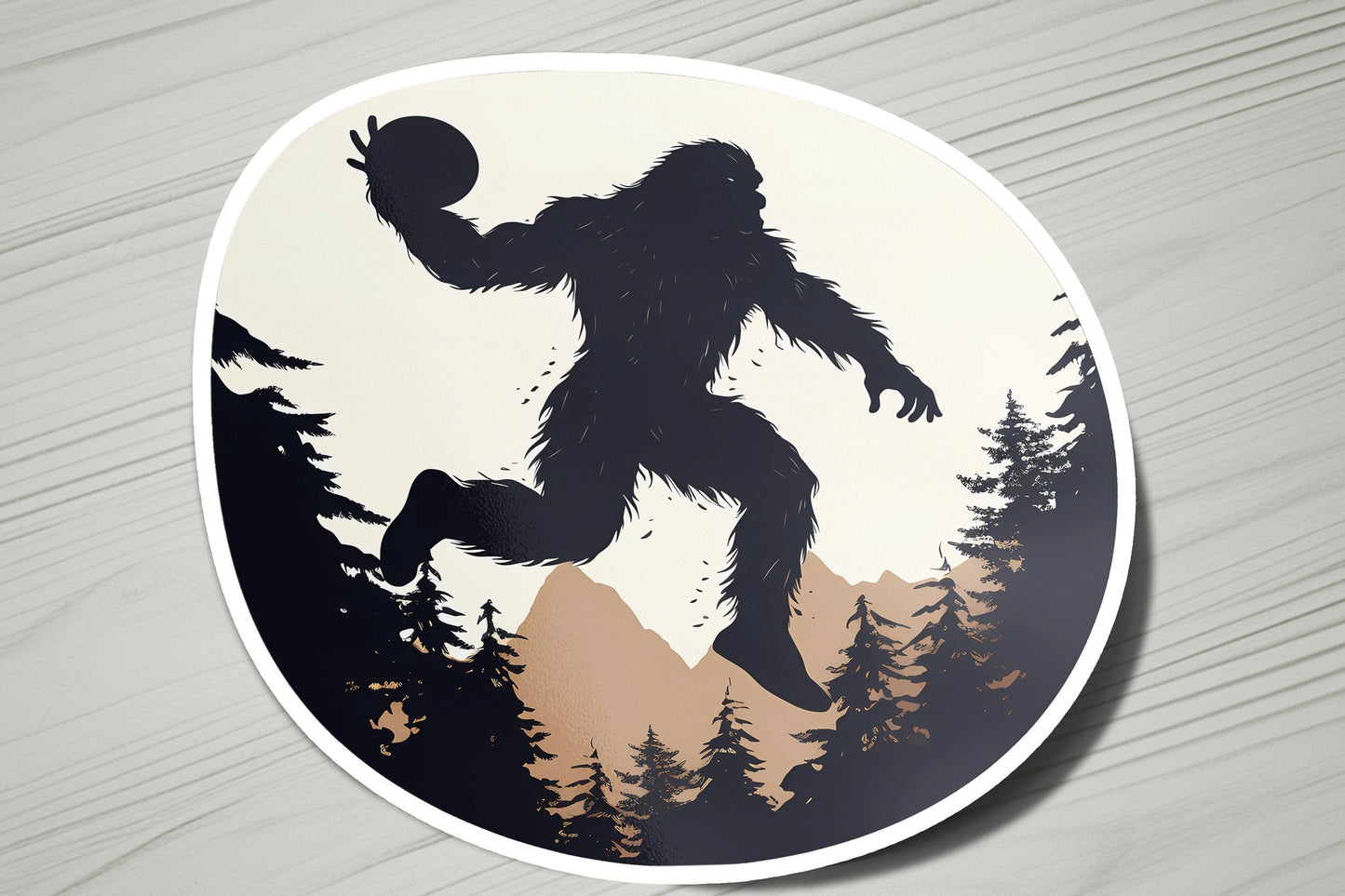 a sticker of a bigfoot holding a basketball