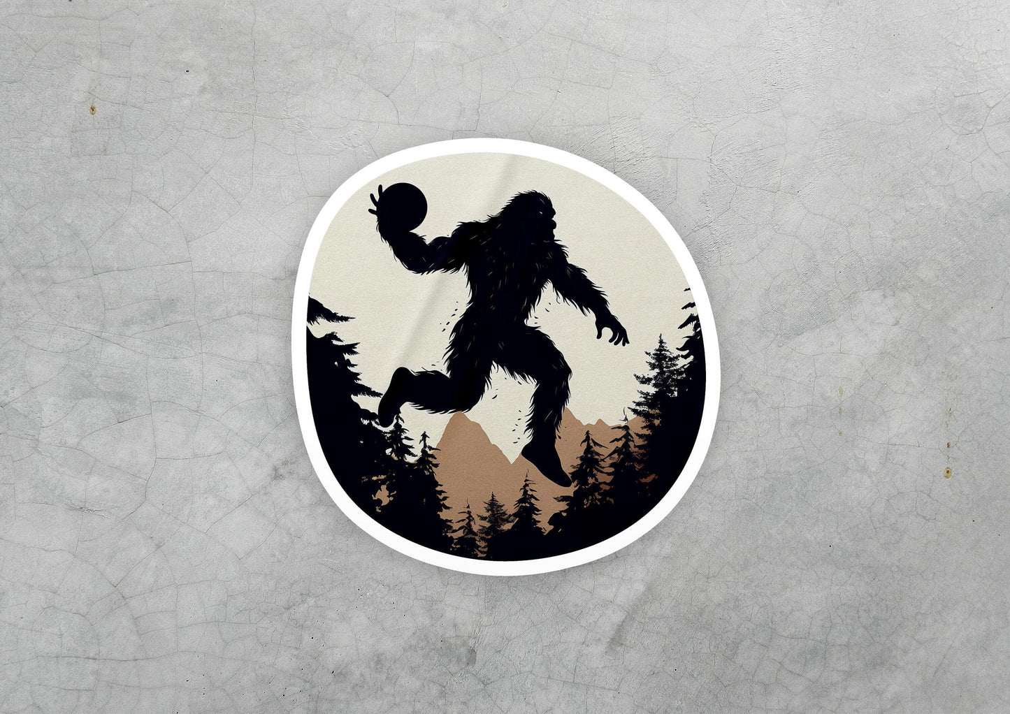 a sticker of a bigfoot holding a basketball