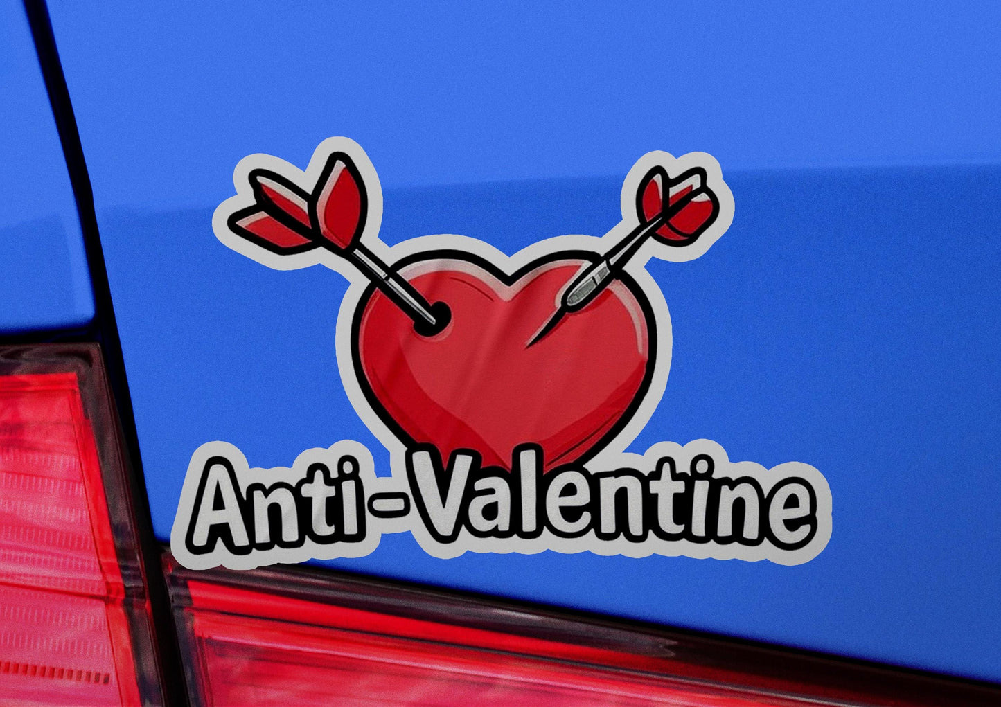 a sticker of a heart with two arrows on it