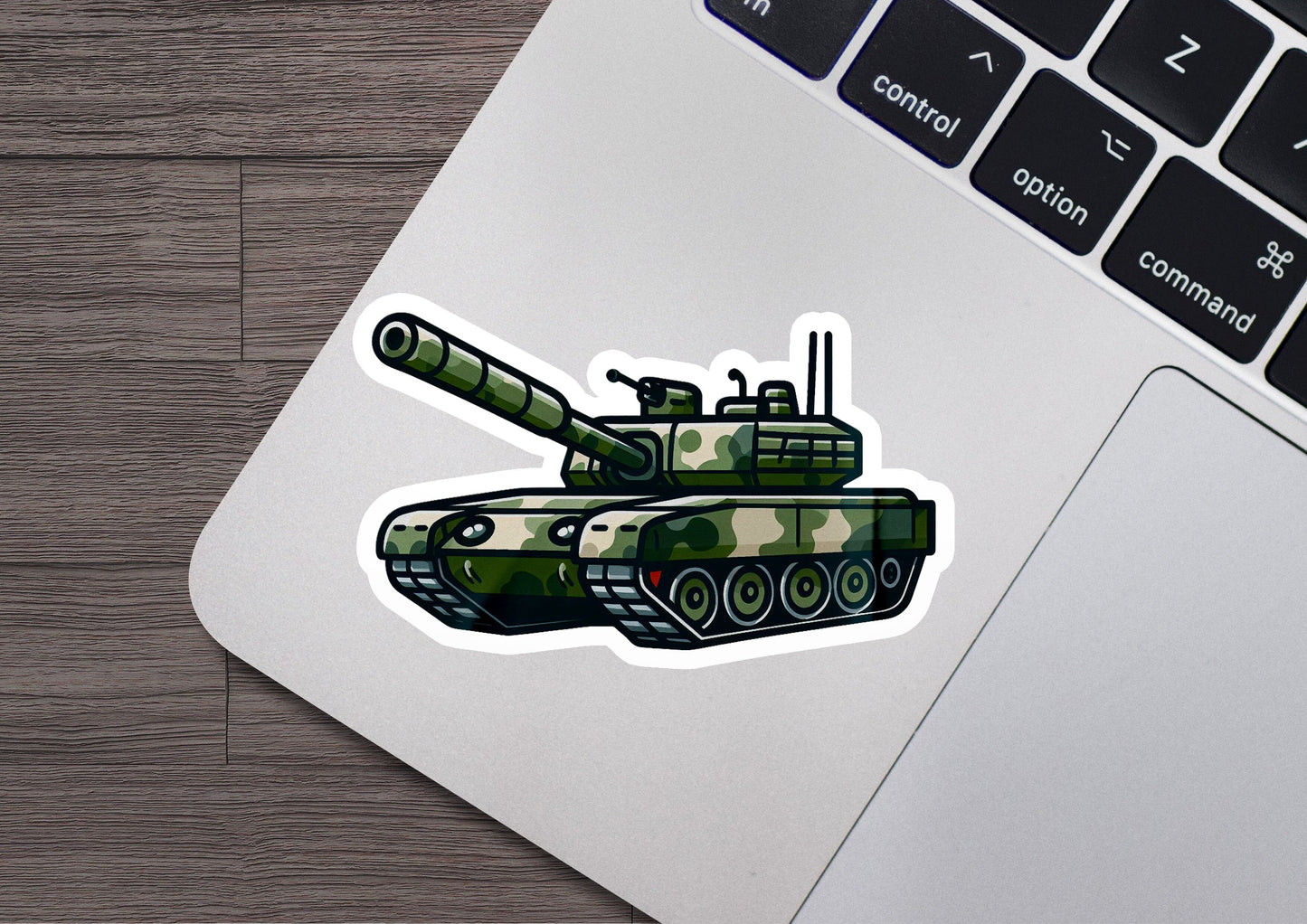 a laptop with a sticker of a tank on it