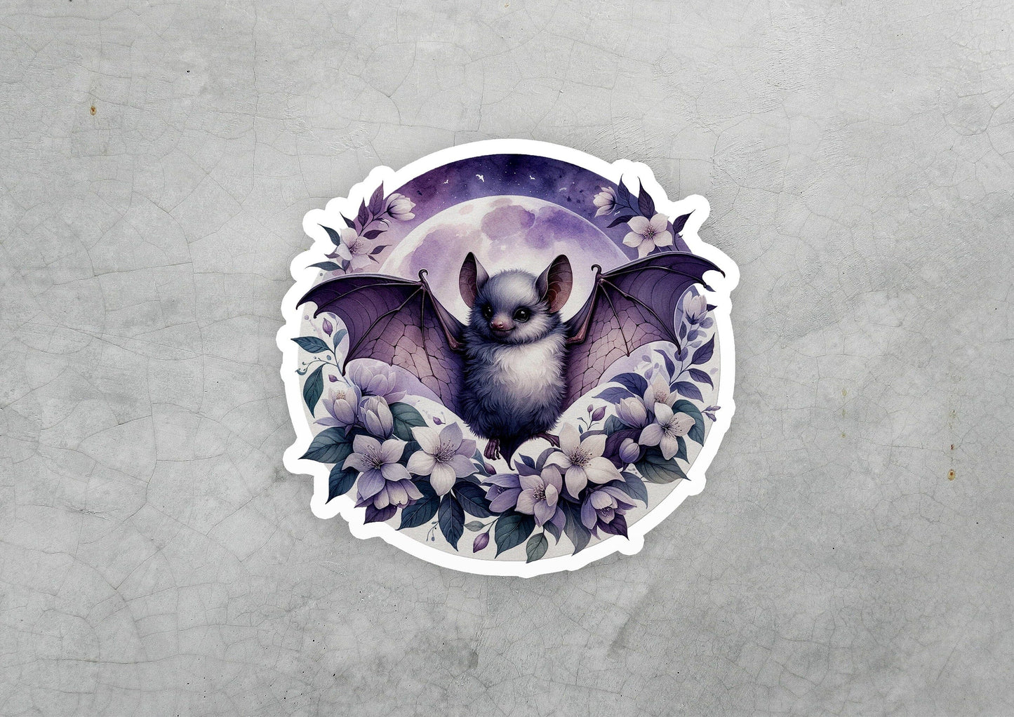 a sticker of a bat with flowers around it