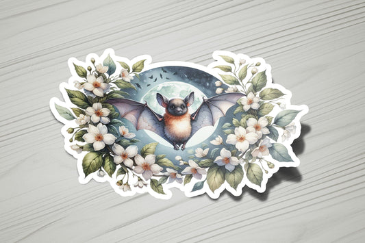 a sticker of a bat with flowers on it