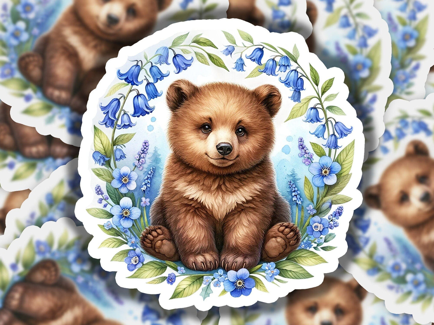 a picture of a brown bear surrounded by blue flowers