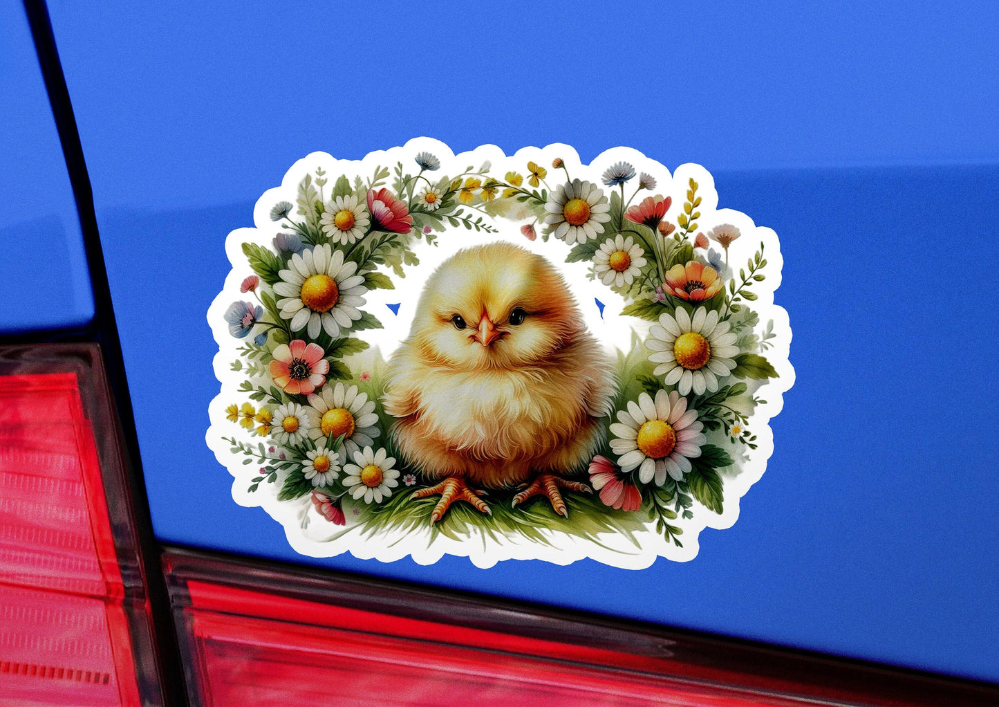 a car with a sticker of a chicken on it