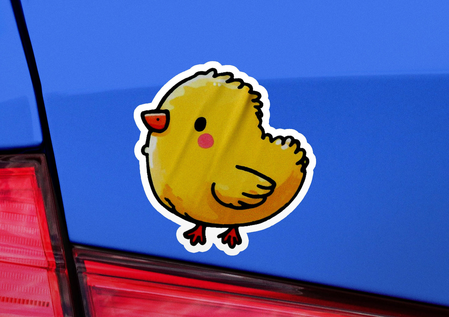 a sticker of a chicken on the back of a car
