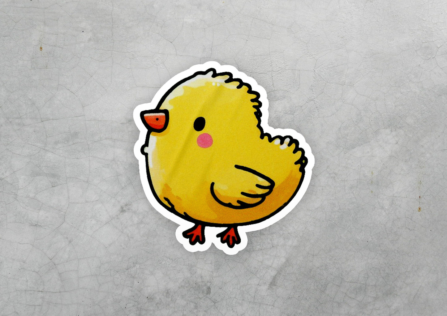 a sticker of a yellow chicken on a gray background