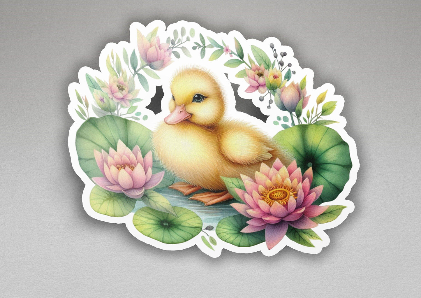 a sticker of a duckling sitting on a lily pad