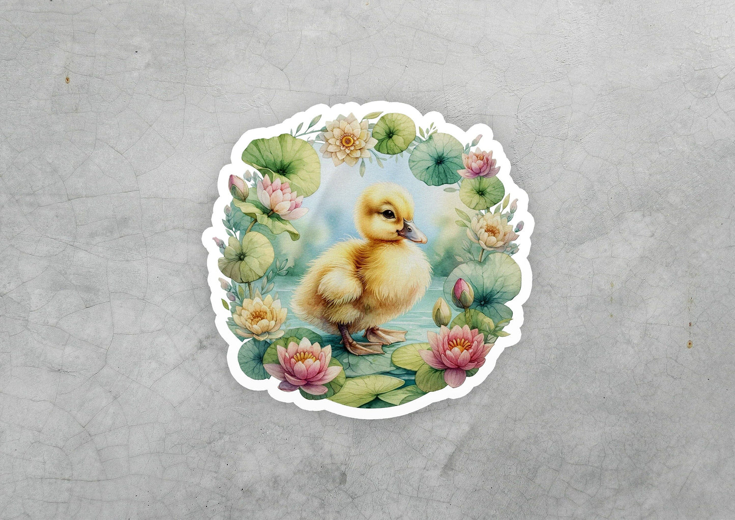 a sticker of a duckling sitting on a lily pad