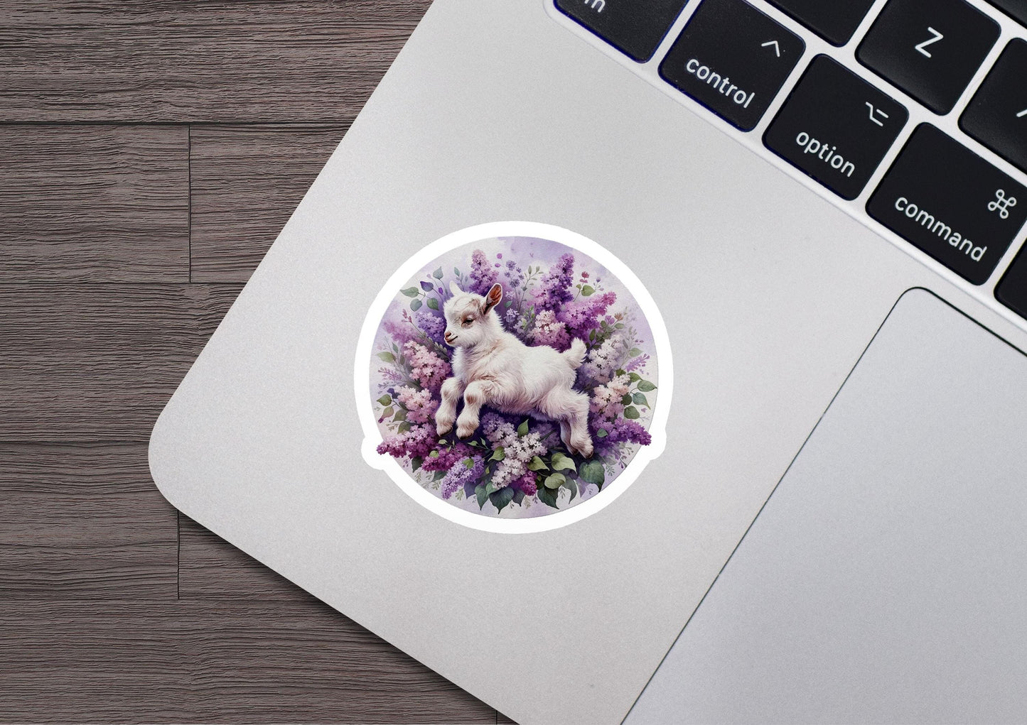 a sticker of a unicorn on a laptop
