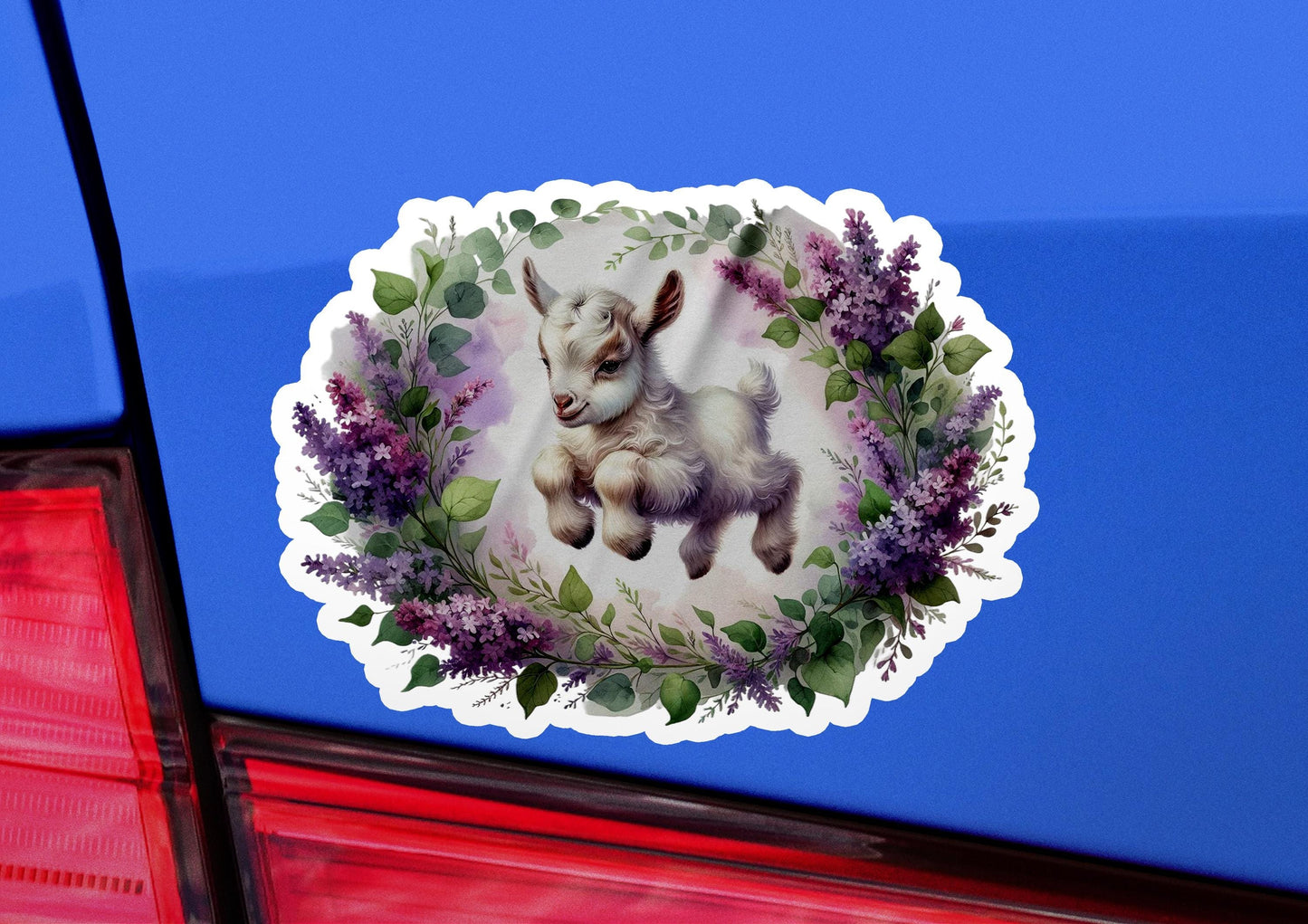 a sticker with a picture of a baby goat on it