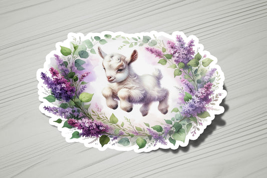 a sticker with a picture of a baby goat on it