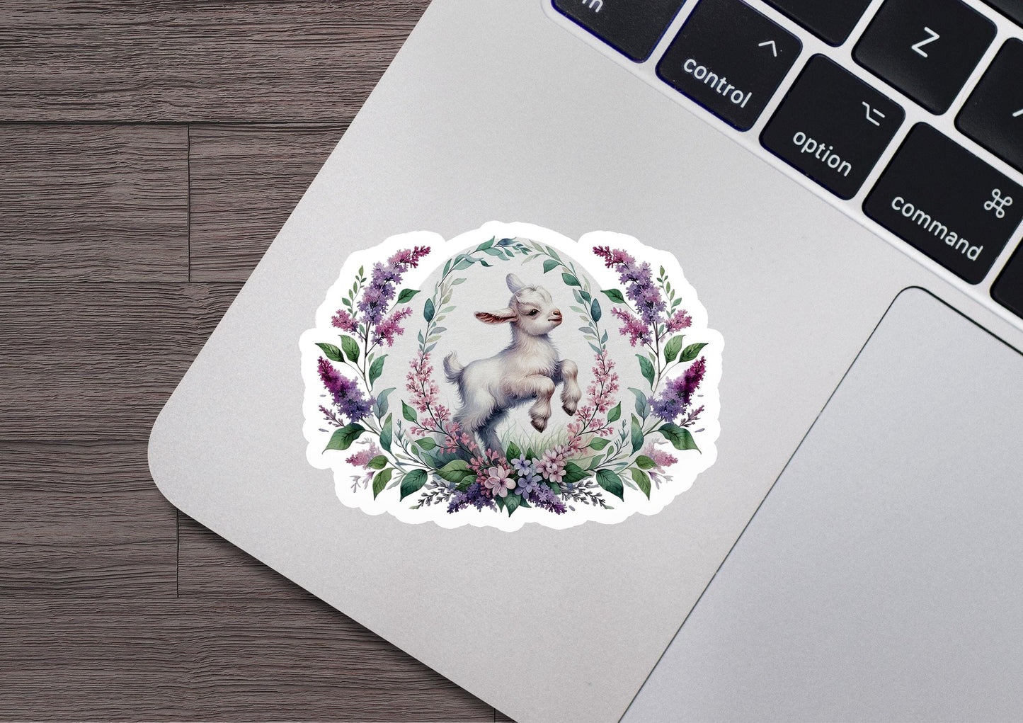 a laptop with a sticker of a dog on it