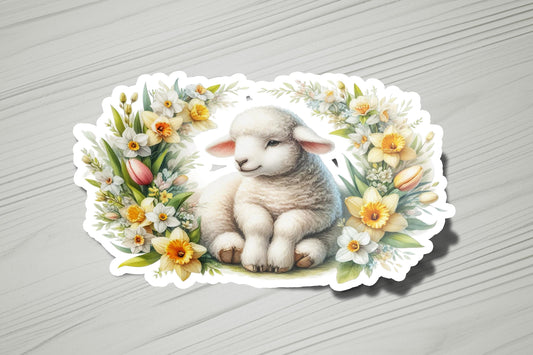 a sticker with a picture of a lamb surrounded by flowers