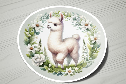 a plate with a picture of a llama surrounded by flowers