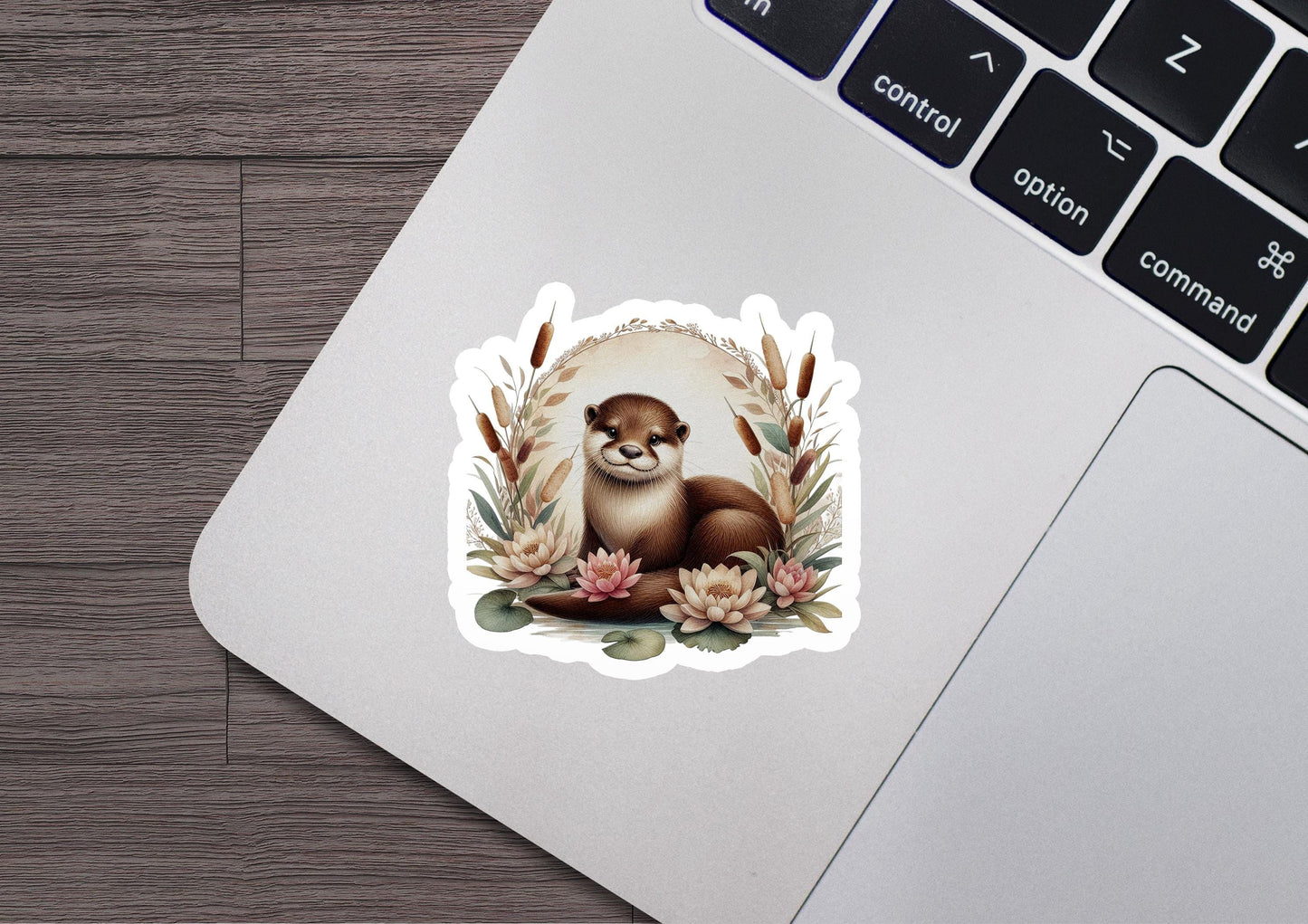 a sticker of a monkey sitting on top of a laptop