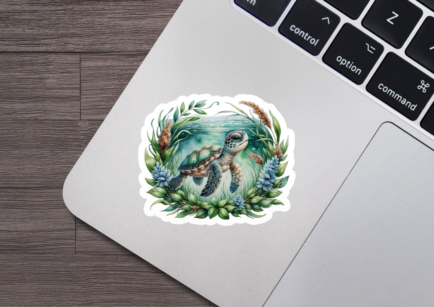 a sticker of an octopus in a wreath on a laptop