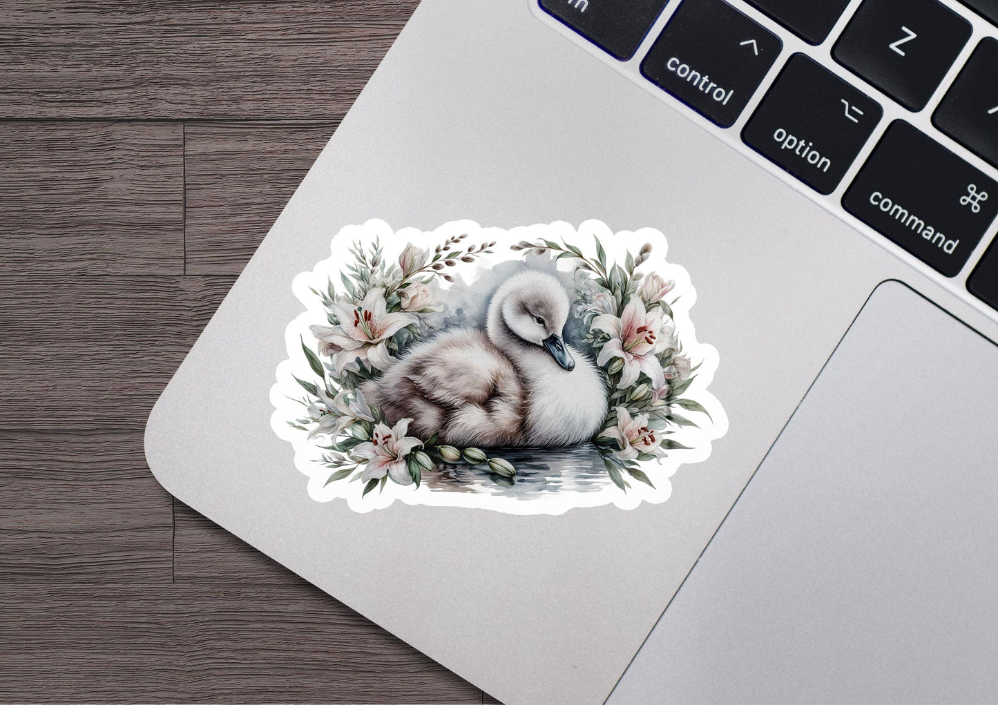 a sticker with a picture of a swan on it