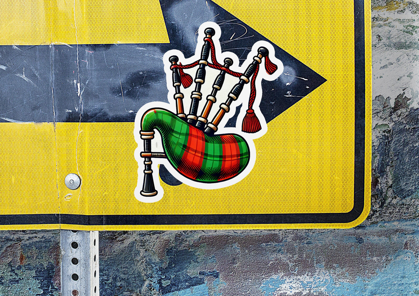 a street sign with a sticker of a musical instrument