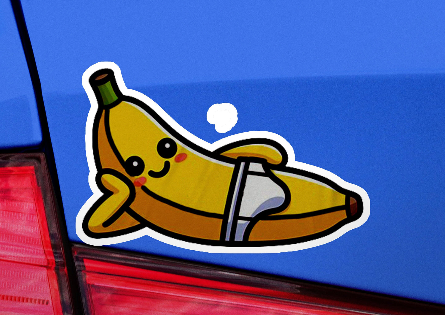 a sticker of a banana on the back of a car