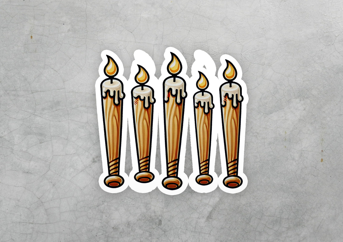 a sticker of a row of lit candles