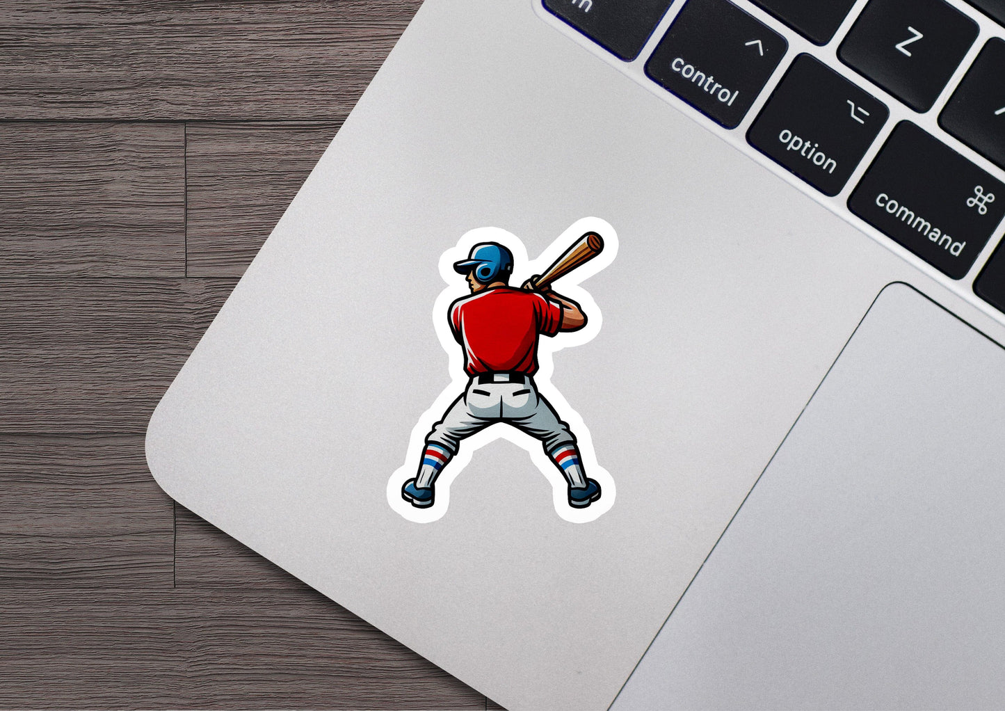 a sticker of a baseball player holding a bat