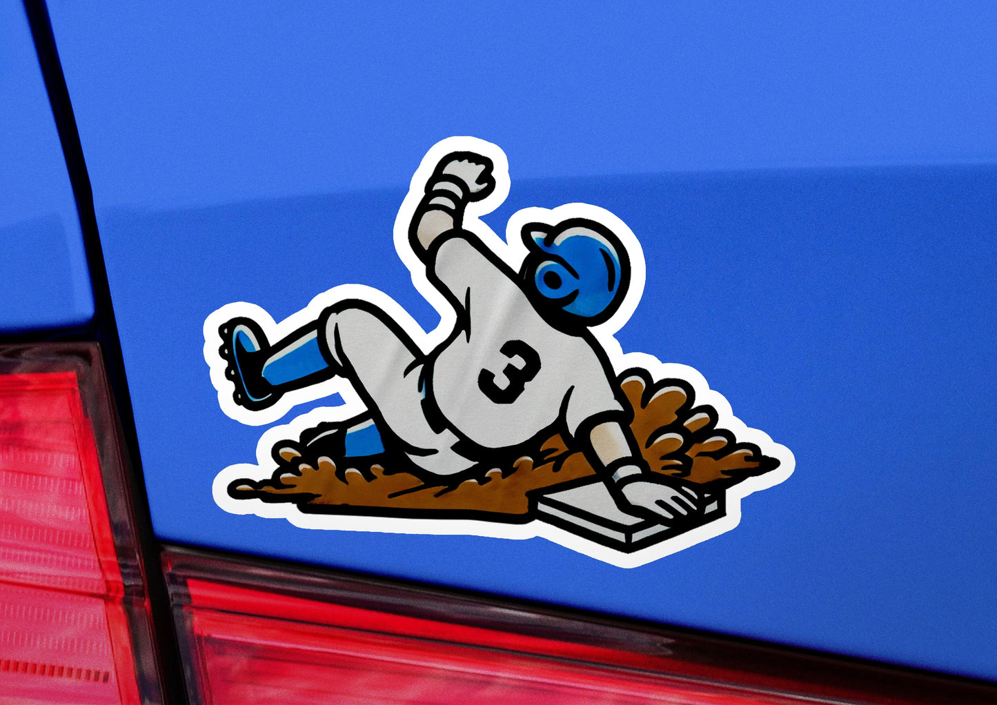 a sticker of a baseball player sliding into a base