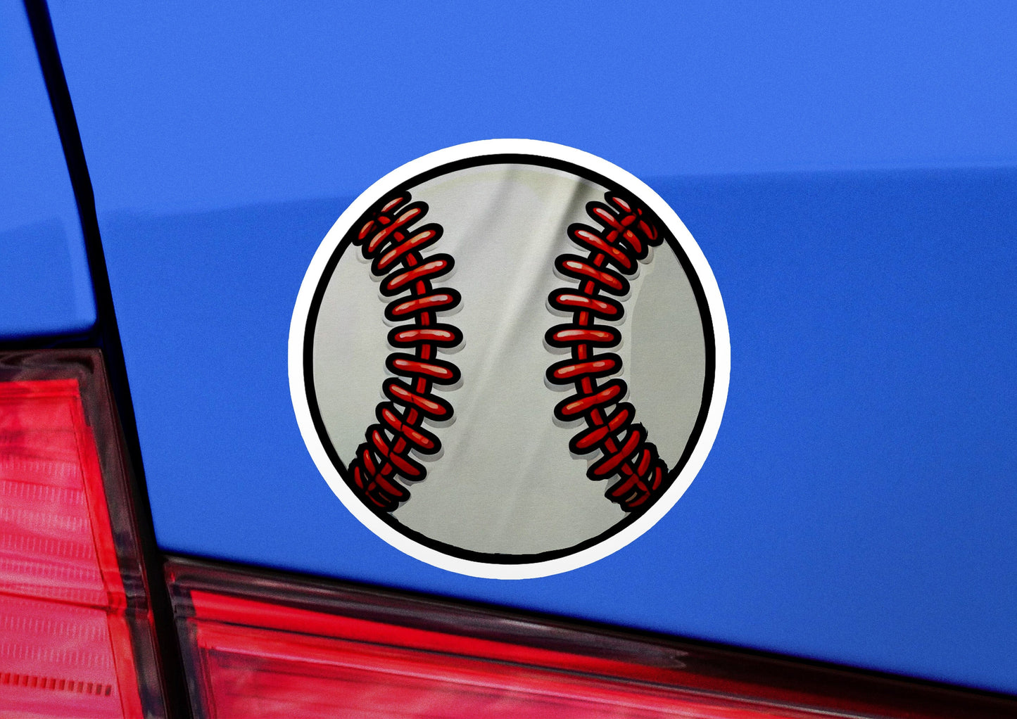 a baseball sticker on the back of a car