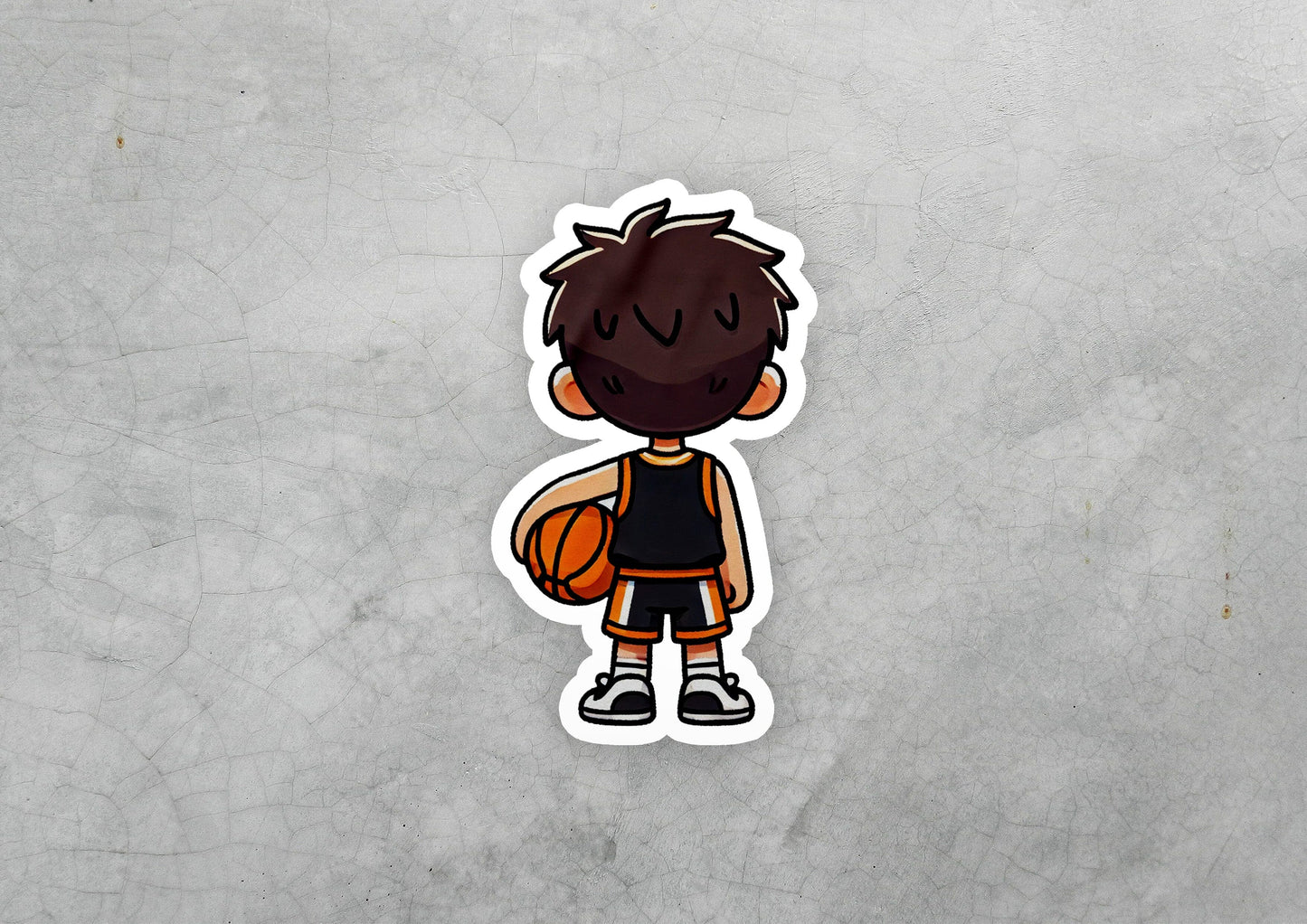 a sticker of a boy holding a basketball