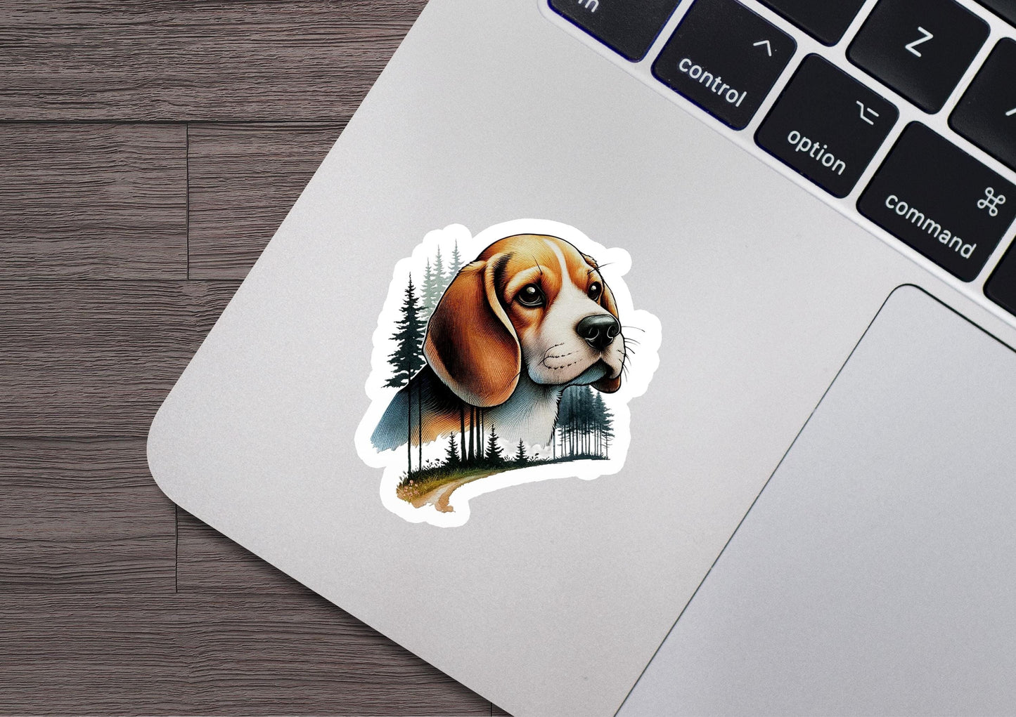 a sticker of a beagle dog on a laptop