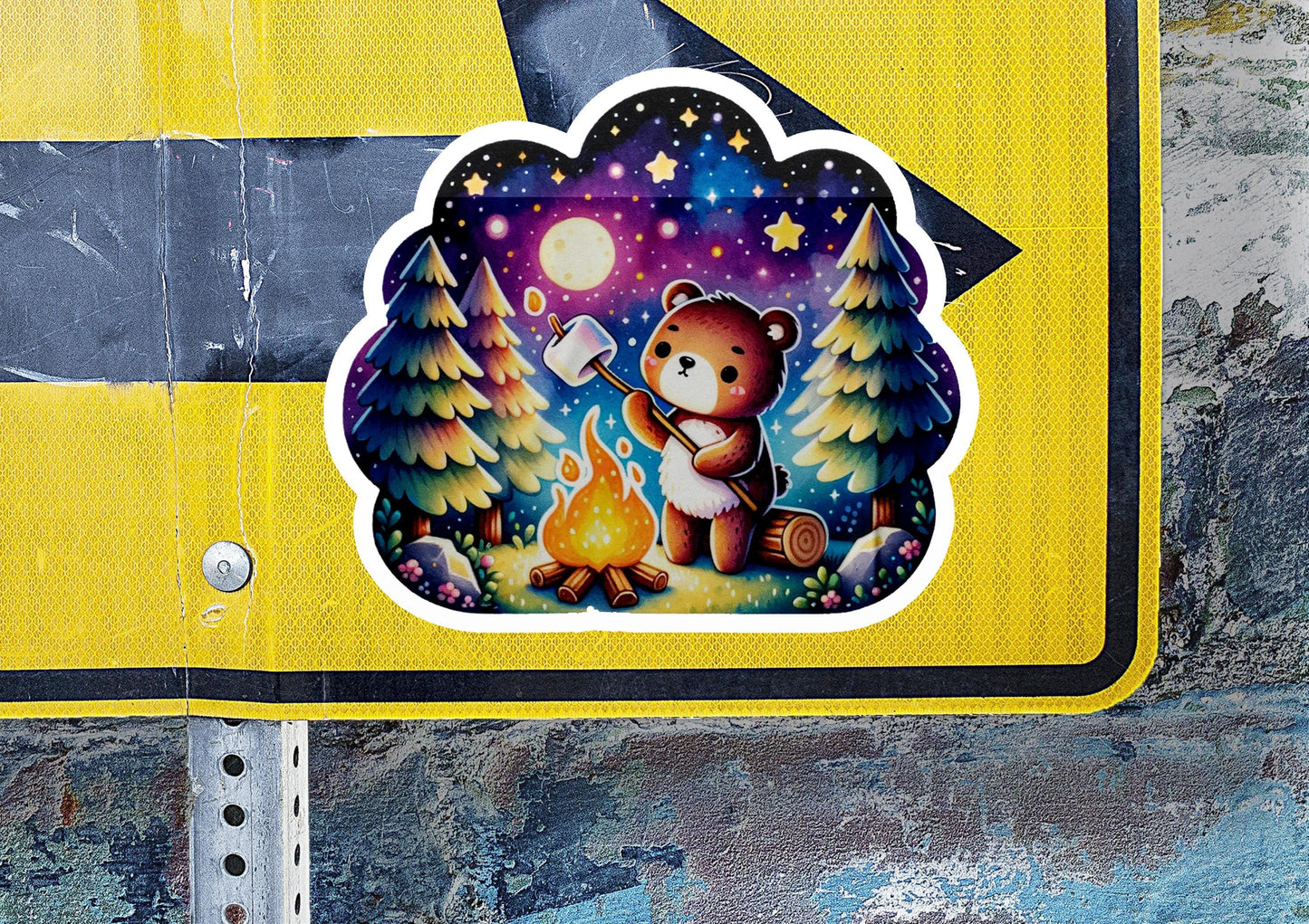 a sticker of a bear with a campfire
