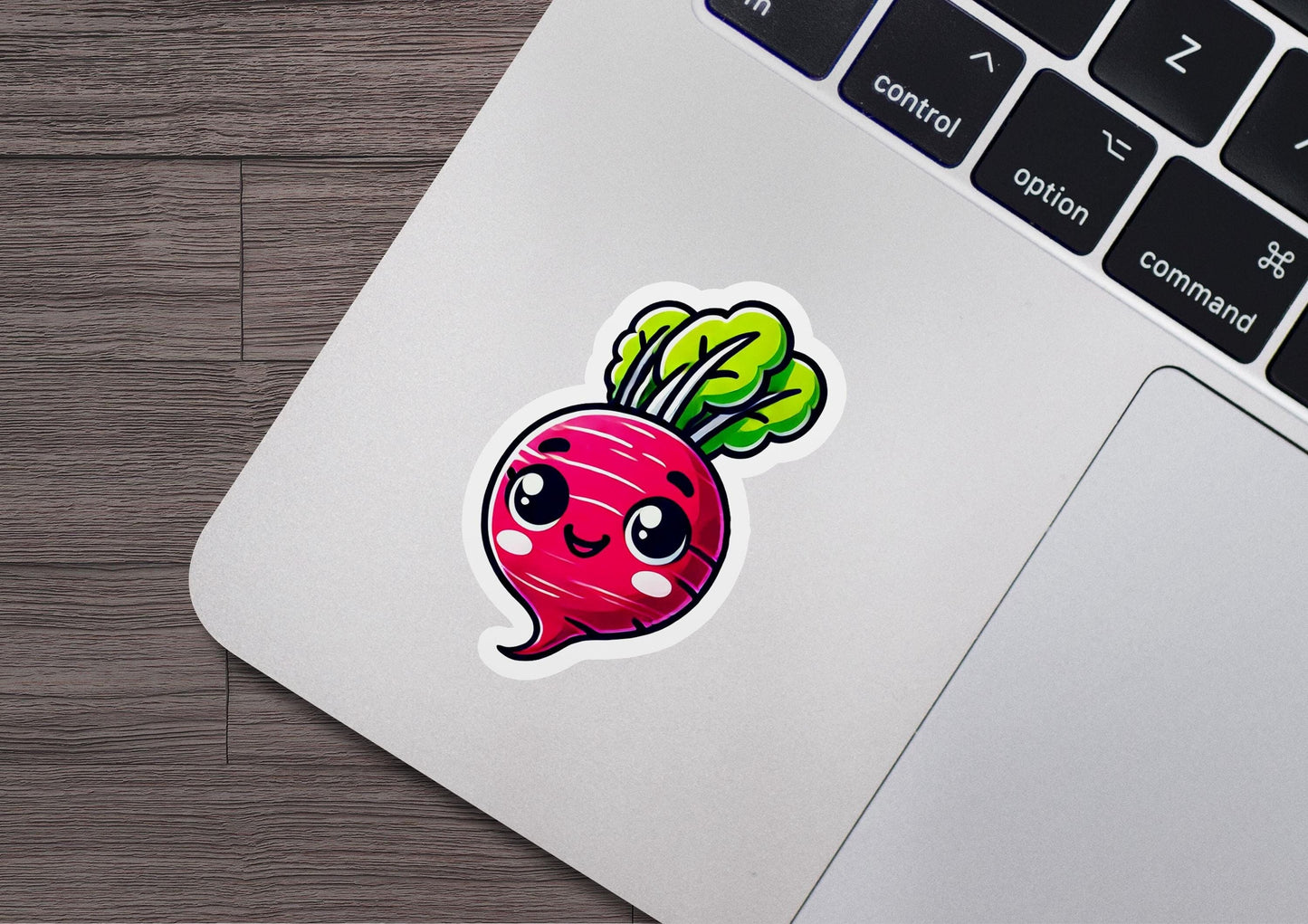 a laptop with a sticker of a radish