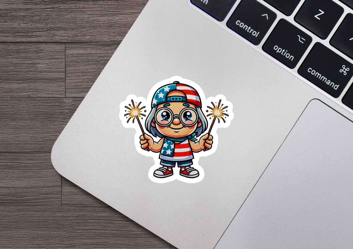 a laptop with a sticker of a cartoon character