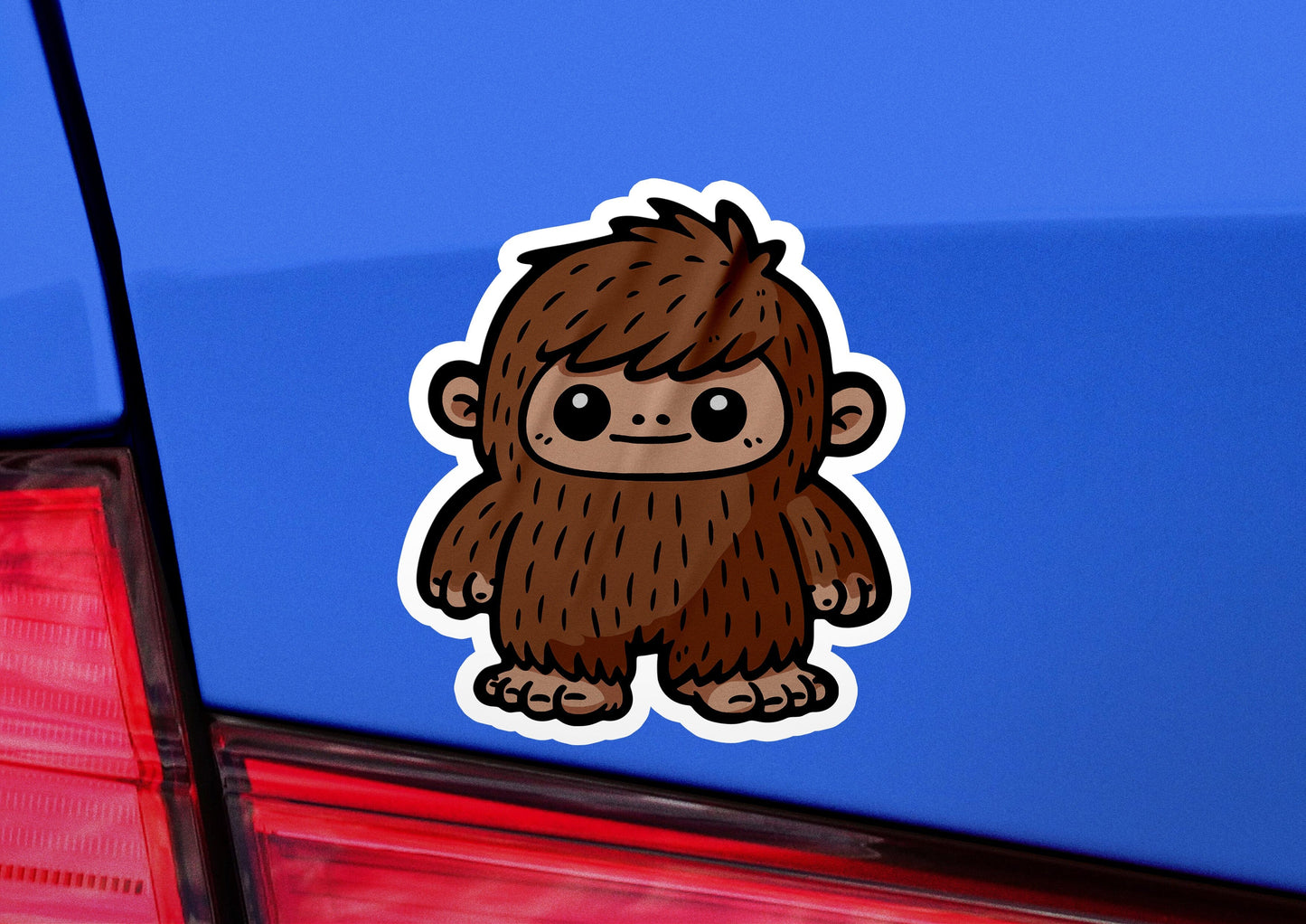 a sticker of a monkey on the back of a car