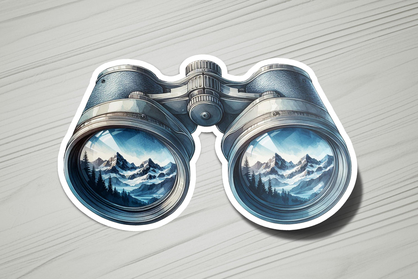 a pair of binoculars sitting on top of a wooden table