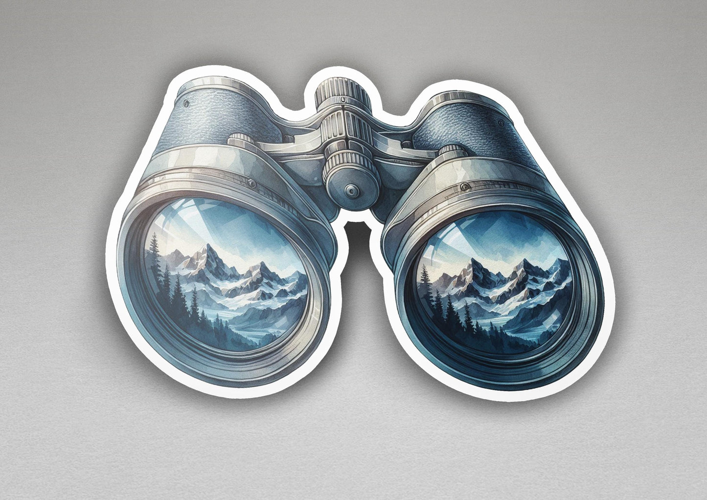 a sticker of a pair of binoculars with mountains in the background