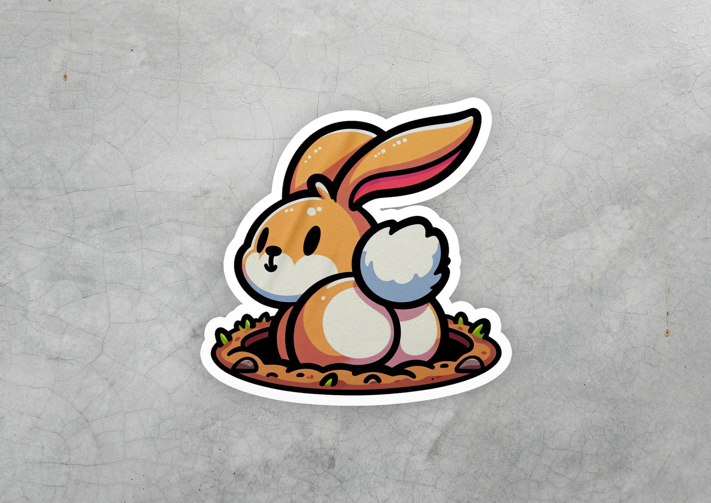 a sticker of a rabbit sitting in a nest