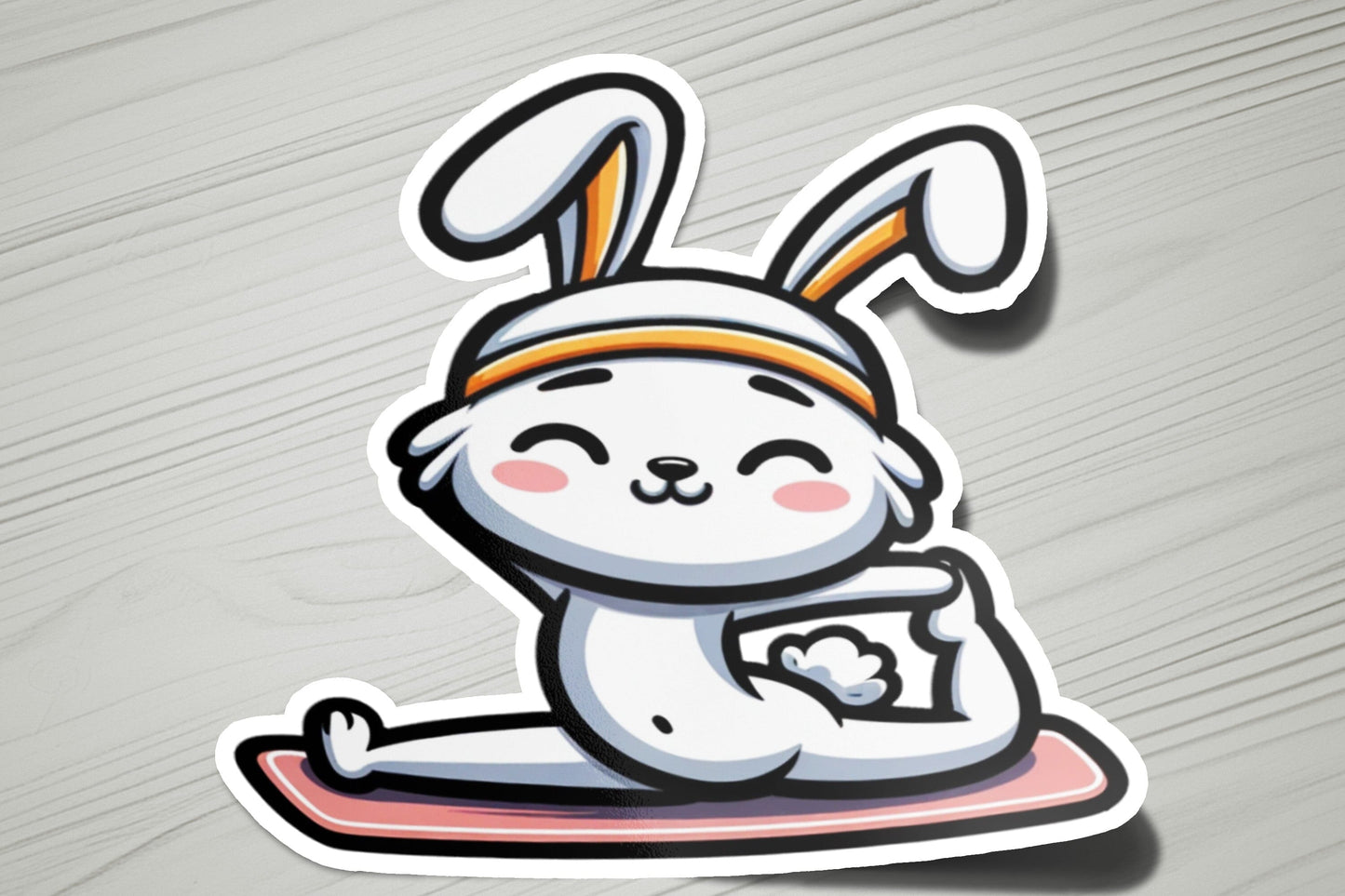 a sticker of a rabbit sitting on a skateboard