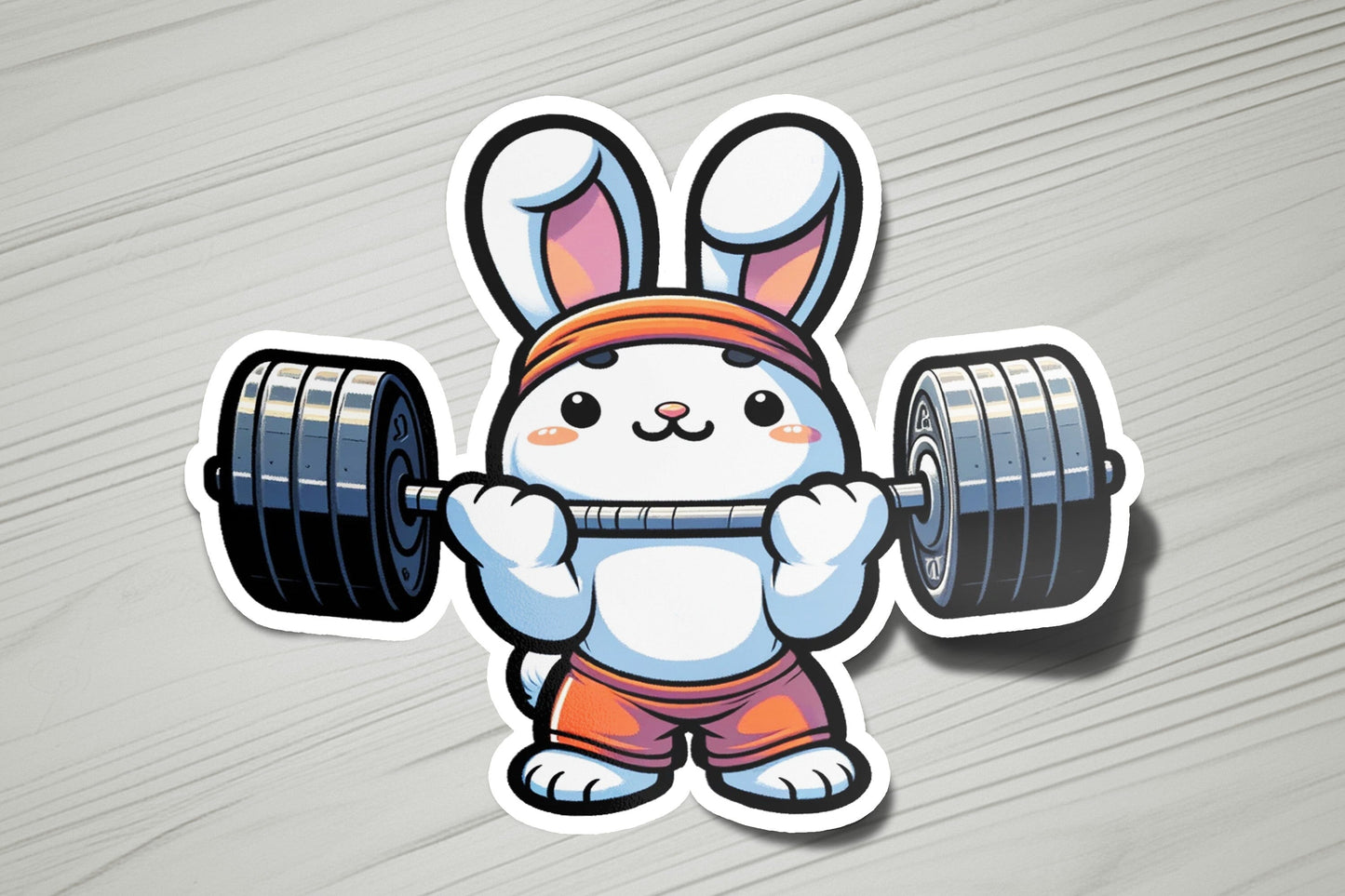 a sticker of a rabbit holding a barbell