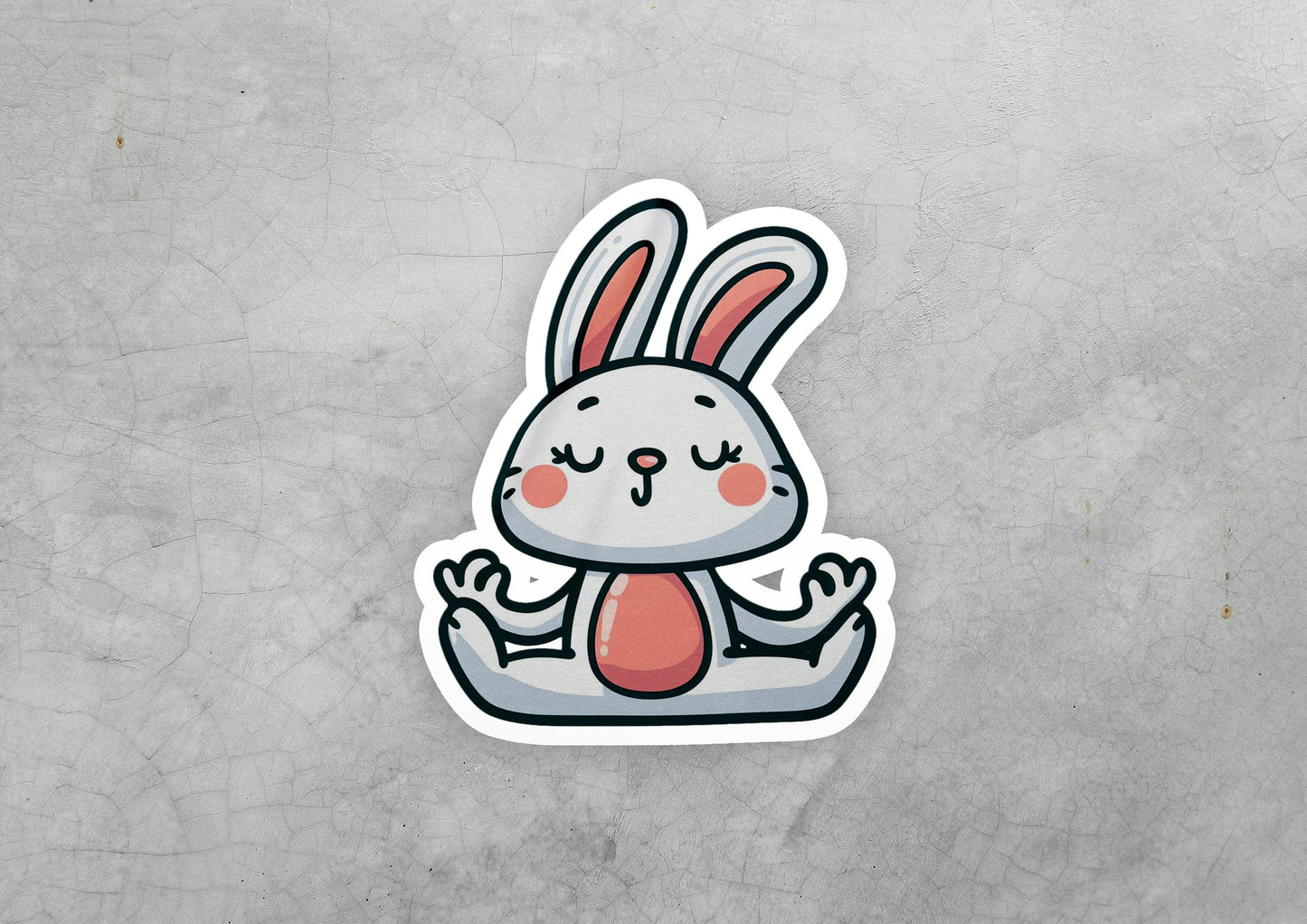a sticker of a rabbit sitting on the ground