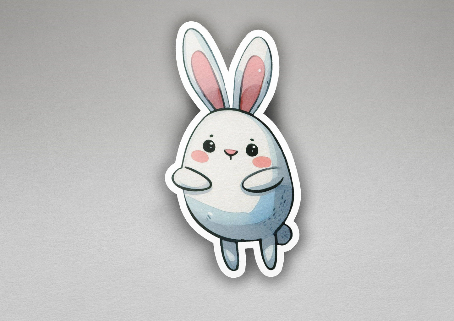 a white sticker with a pink nose and ears