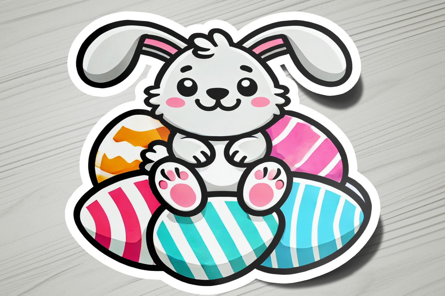 a sticker of a bunny sitting on top of an egg
