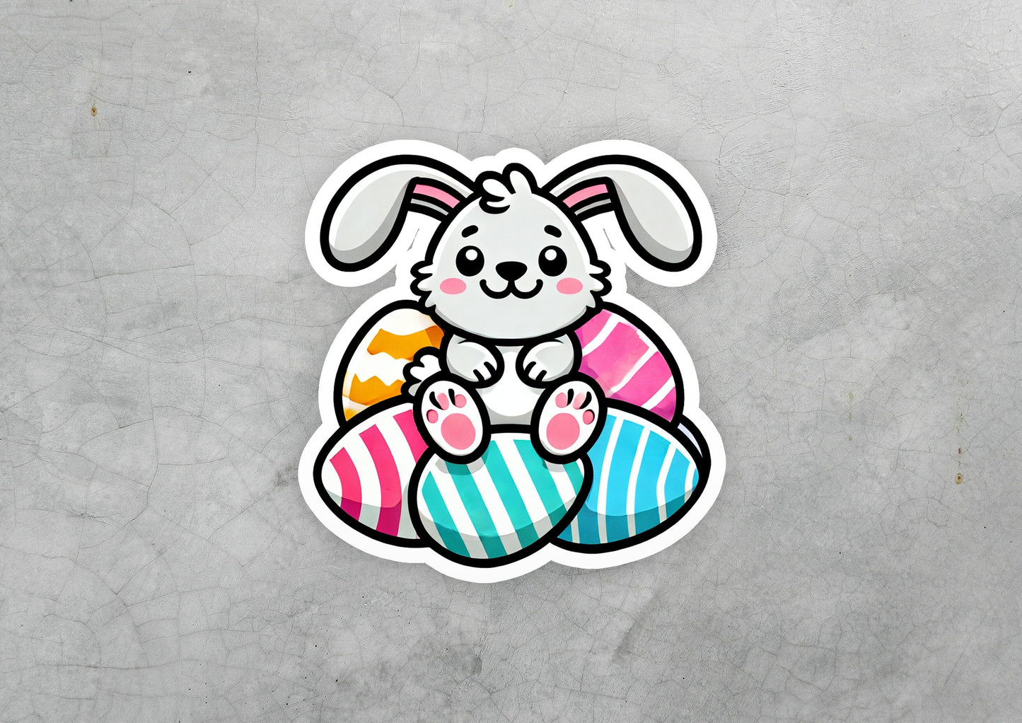a sticker of a bunny sitting on an egg