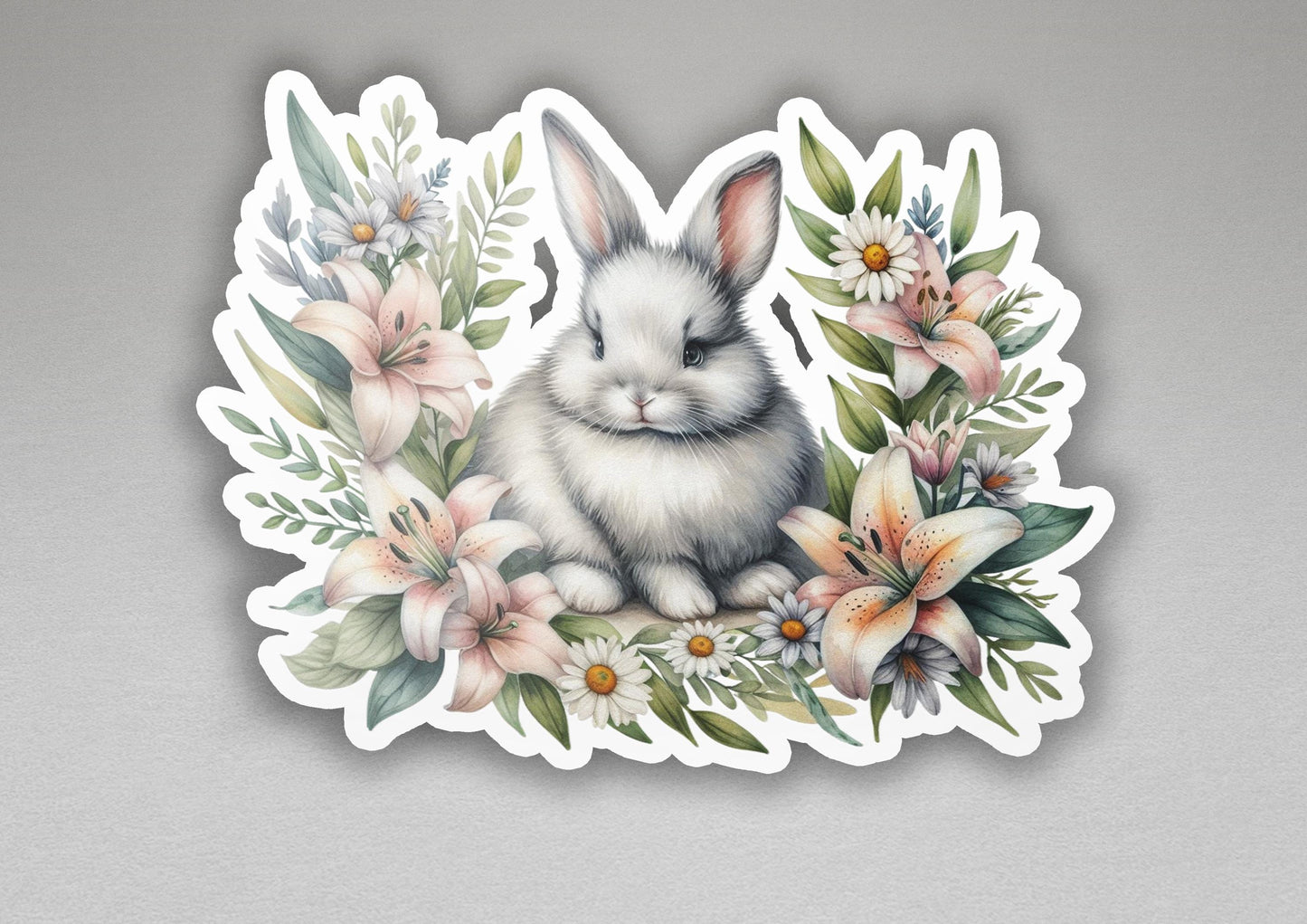 a sticker of a white rabbit surrounded by flowers