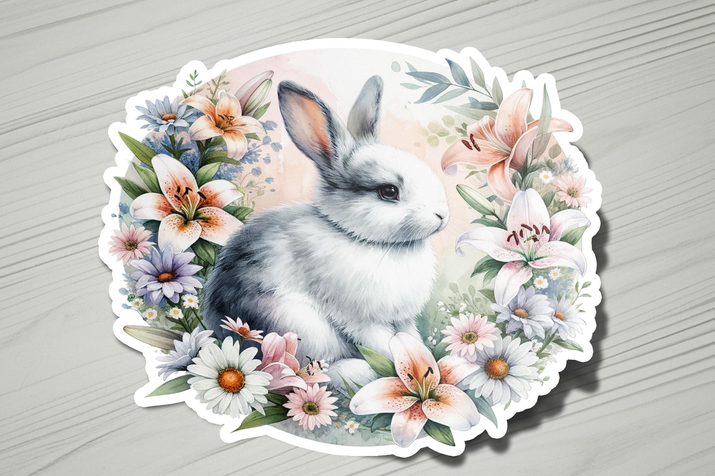 a sticker with a picture of a rabbit surrounded by flowers