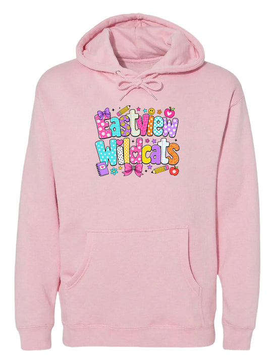 A pink hoodie with a colorful graphic design featuring the text "Eastview Wildcats" and various decorative elements.