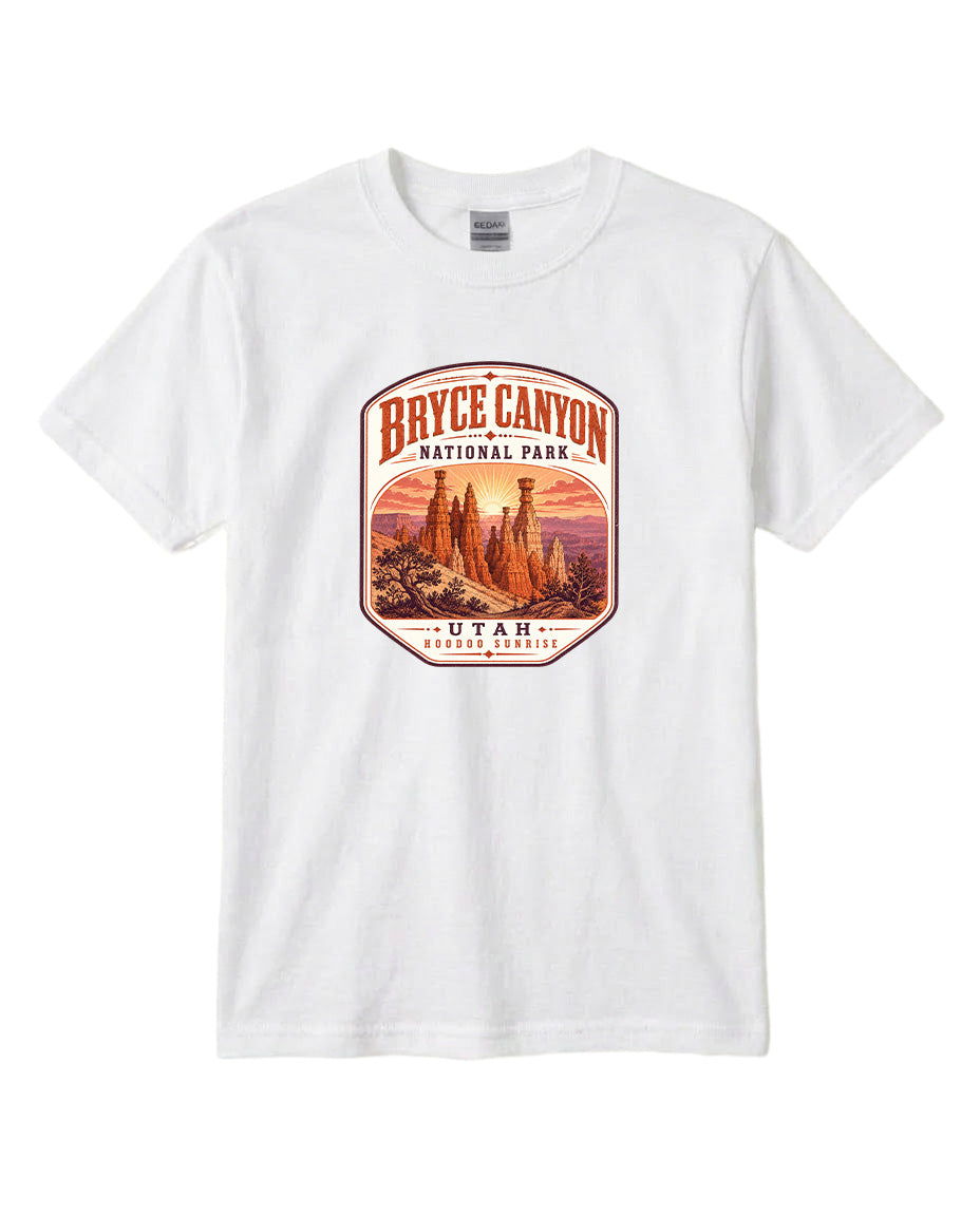 A white t-shirt with a graphic design depicting the Bryce Canyon National Park in Utah.
